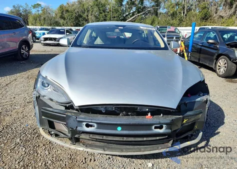 2012 Tesla Model S z USA, uszkodzony, nr VIN 5YJSA1DP1CFP03227